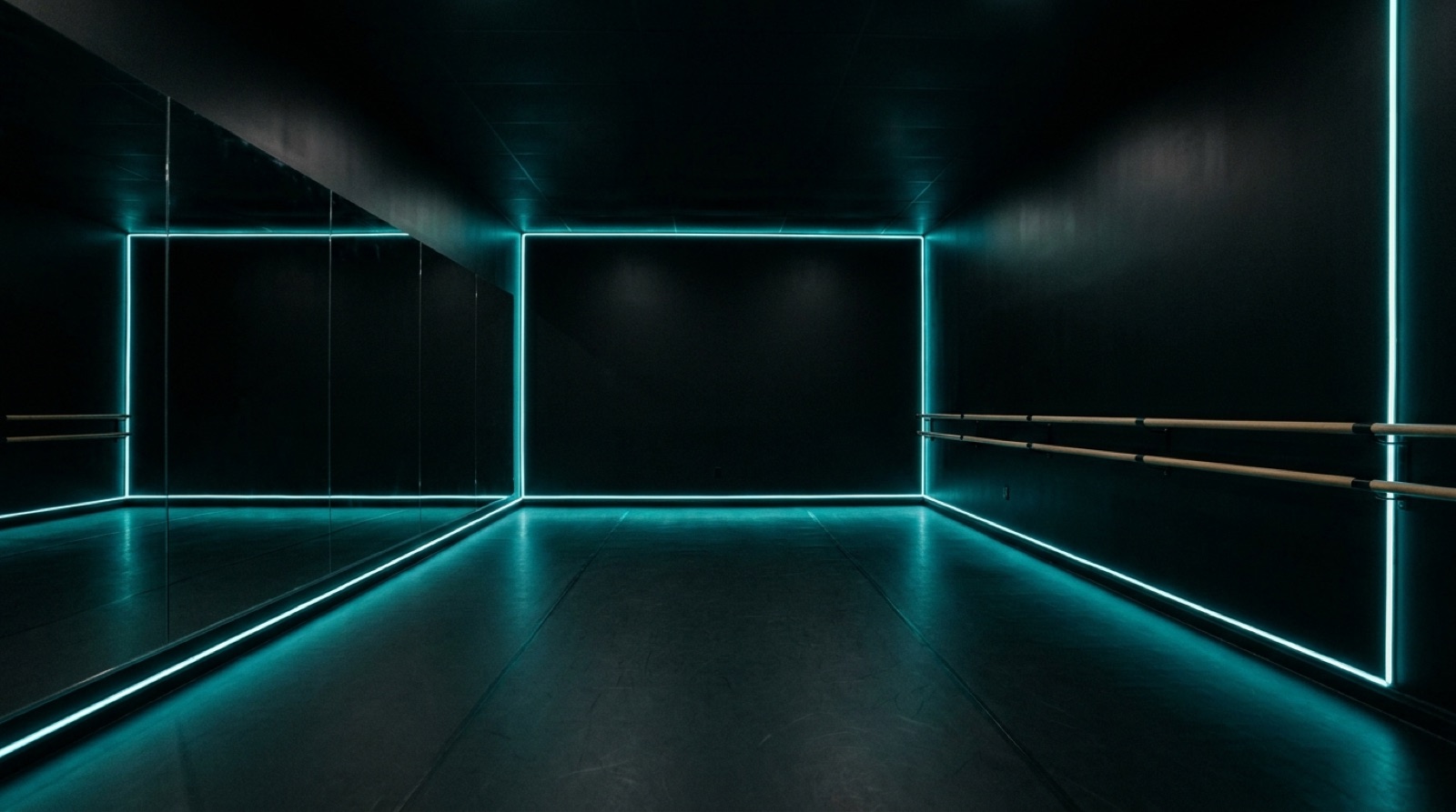 Studio 1, an all-black studio lit with teal LED light